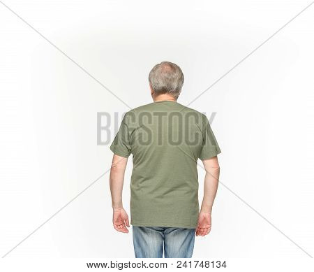 Closeup Of Senior Man's Body In Empty Green T-shirt Isolated On White Background. Mock Up For Disign