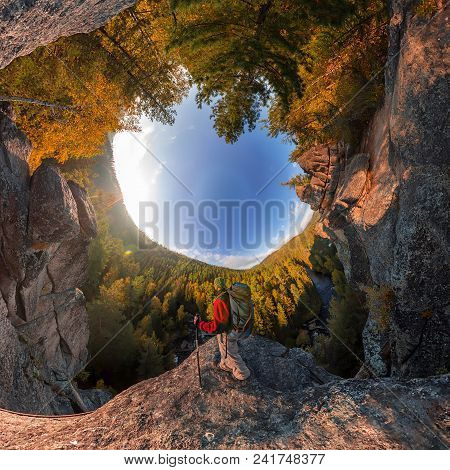 Backpacker On Top Of A Rock Fall At Dawn. Spherical Degree Panorama 360 180 Little Planet.