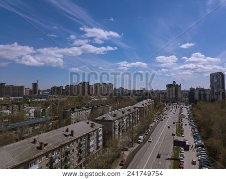 Forest In The Novosibirsk City,siberia With Diffrent Trees And Plants With Some Buildings In It. Str