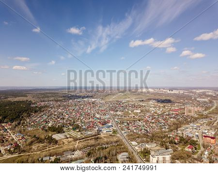 Forest In The Novosibirsk City,siberia With Diffrent Trees And Plants With Some Buildings In It. Str