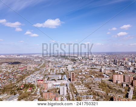 Forest In The Novosibirsk City,siberia With Diffrent Trees And Plants With Some Buildings In It. Str