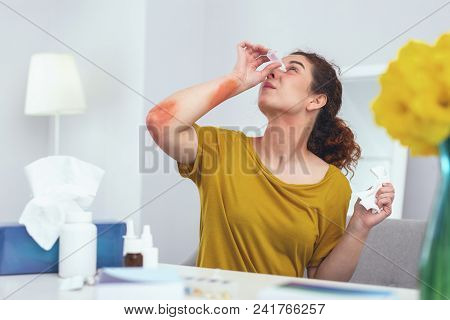 Annoying Allergy. Young Allergic Girl Performing Complex Self Medical Aid While Dealing With Skin Ra