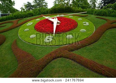 Flower clock in Geneve garden near Lake Geneva Switzerland Swiss