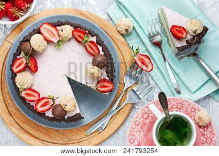 Chocolate Strawberry Bavarian Cream Cake, Decorated With Chocolate Glaze, Chocolate Candies, Almond 