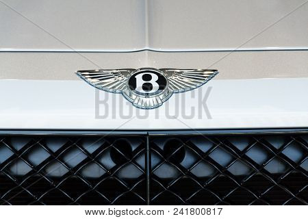 Berlin, Germany - April 15 2018: Bentley Company Logo On Bentley Bentayga Car Standing At Volkswagen