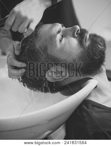 Mens Heals Body Care. Man With Serious Face In Barbershop, New Technology. Barber And Hairdresser, F