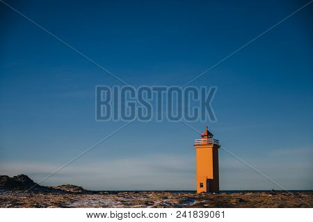 Beautiful View Of Lighthouse And Icelandic Seacoast At Sunny Day, Stafnesviti, Reykjanes, Iceland