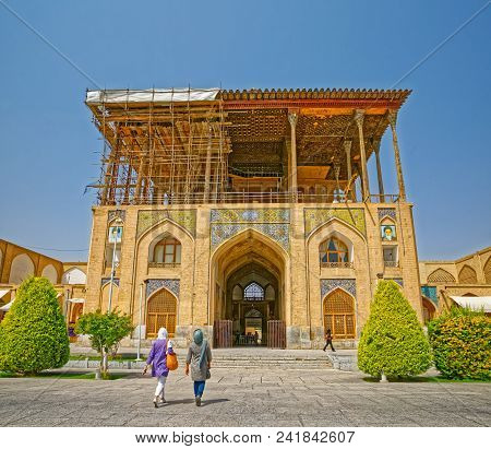Isfahan, Iran - May 7, 2015: Frontal View Of The Ali Qapu Palace In Renovation At The Imam Square.
