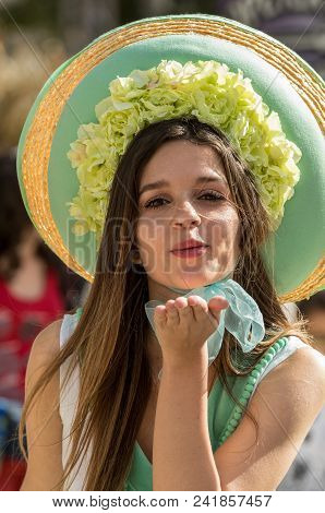 Funchal; Madeira; Portugal - April 19; 2018: Womn In Colorful Costumes On Avenida Arriaga At The Mad