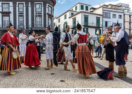 Funchal, Portugal - April 19, 2018:  Folk Musicians And Dancers Performing On The Avenida Arriaga  I