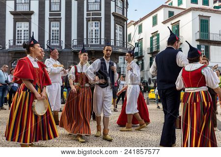 Funchal, Portugal - April 19, 2018:  Folk Musicians And Dancers Performing On The Avenida Arriaga  I
