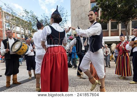 Funchal, Portugal - April 19, 2018:  Folk Musicians And Dancers Performing On The Avenida Arriaga  I