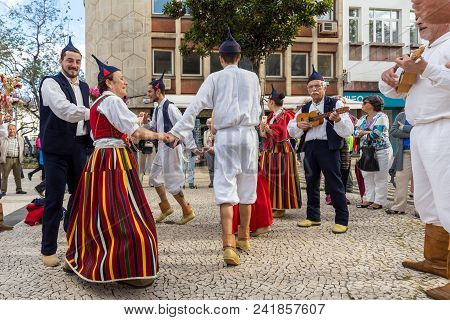 Funchal, Portugal - April 19, 2018:  Folk Musicians And Dancers Performing On The Avenida Arriaga  I