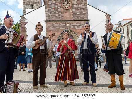 Funchal, Portugal - April 19, 2018:  Folk Musicians And Dancers Performing On The Avenida Arriaga  I