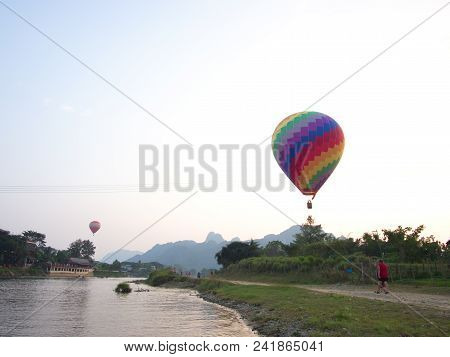 Multi Color And Colorful Balloon With A Blue Sky , Travel In The River City Of Vang Viang City, Laos