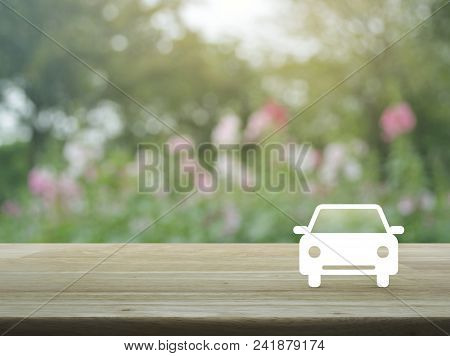 Taxi Car Flat Icon On Wooden Table Over Blur Pink Flower And Tree, Business Service Car Concept