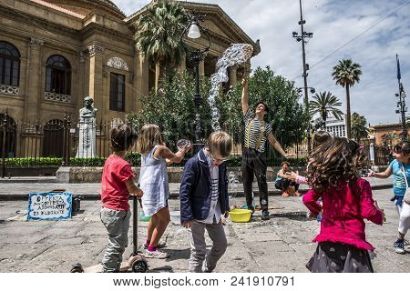 Palermo, Italy - April, 2018: Street Artist Making Soap Bubbles On The Street In Piazza Giuseppe Ver