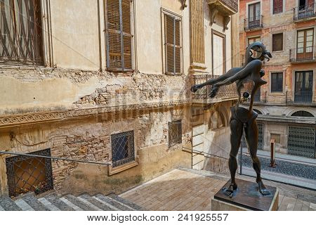 FIGUERES, GIRONA/SPAIN - JULY 22, 2017: Dali sculpture tribute to Isaac Newtonin in Baixada Mercer street at Figueres near museum at Catalonia