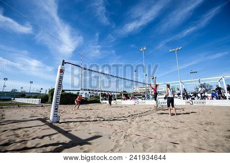 Ostia, Italy. March 29, 2015: Beachvolley Match Between Friends On The Sand At The Sea In Ostia, A T