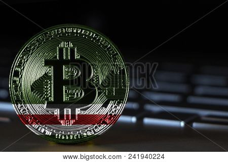 Bitcoin Close-up On Keyboard Background, The Flag Of Chechen Republic Of Ichkeria Is Shown On Bitcoi