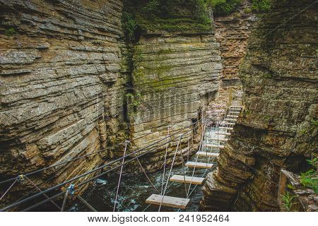 Adventurous Rope Bridge Over Ausable River Seen At Ausable Chasm Tourist Attraction Near Keeseville,