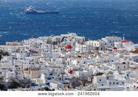Aerial View Of The City Chora From A Hill On A Sunny Day. Greece. The Island Mykonos.