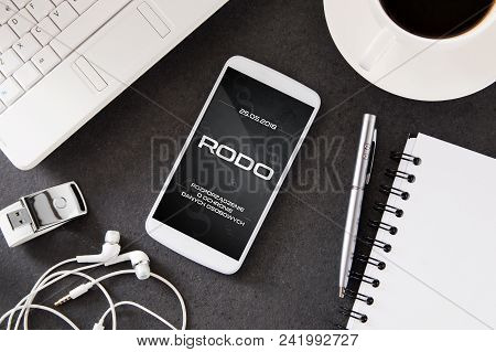 Smartphone Lies On Desk With Rodo Sign On Display. Conception Of  General Data Protection Regulation