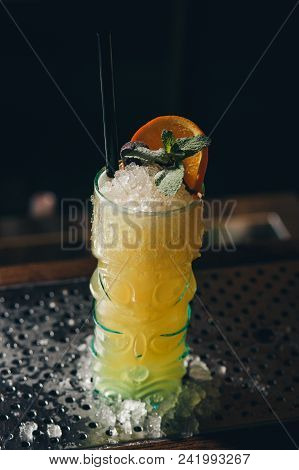 Yellow Cocktail Decorated With Mint Leaf Luxury.