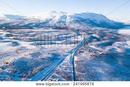 Aerial Sunny Winter View Of Abisko National Park, Kiruna Municipality, Lapland, Norrbotten County, S