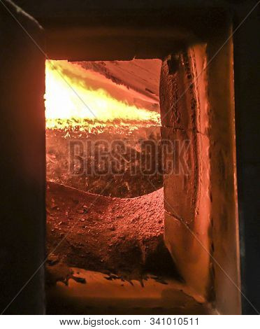 Fire In The Boiler Furnace Grate The View Through The Hatch