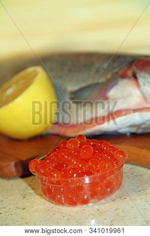 Rainbow Trout Fish Red Caviar And Lemon. Cooking Fish Dish With Lemon. Tasty Fish Dish. Cooking Red 