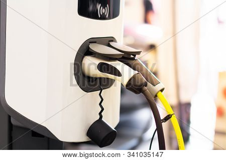 Modern Electrical Fast Charger To Electrical Or Hybrid Phev Automobiles. Future Energy Power. Ecolog