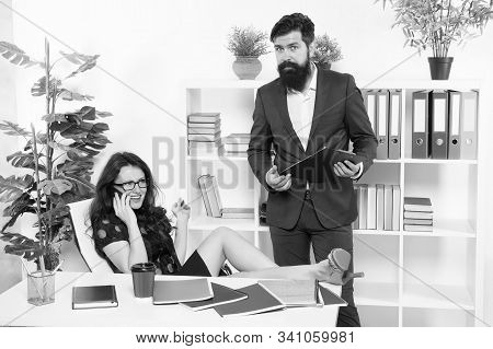 Workplace Relations. Business Professionals At Workplace. Working Couple Solve Workplace Problem. Be