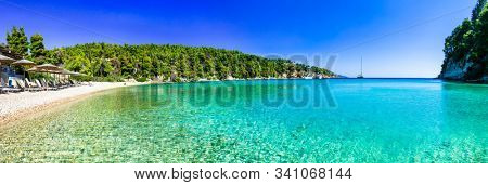 Best beaches of Alonissos island - tranquil organized Milia. Sporades. Greece