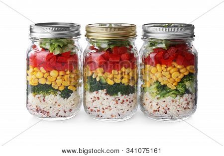 Glass Jars With Healthy Meal Isolated On White