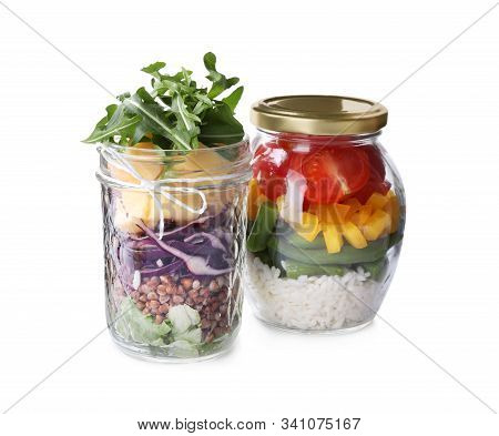 Glass Jars With Healthy Meal Isolated On White