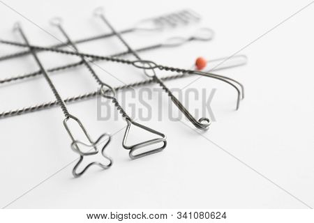 Set Of Logopedic Probes On White Background. Speech Therapist's Tools