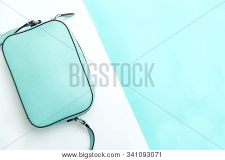 Minty Hue Handbag On Minty Hue Background. Copy Space. Color 2020