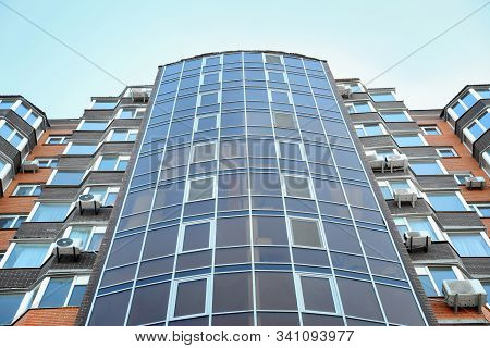 Modern Building With Tinted Windows, Low Angle View. Urban Architecture