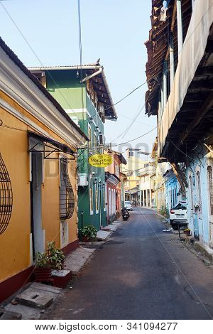 Panaji, India - December 15, 2019: A Narrow Lane Surrounded By Colorful Portuguese Houses In Panjim,