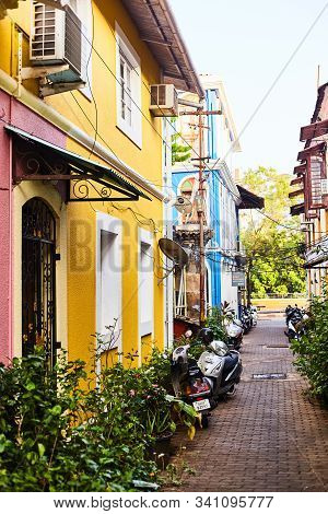 Panaji, India - December 15, 2019: A Narrow Lane Surrounded By Colorful Portuguese Houses In Panjim,