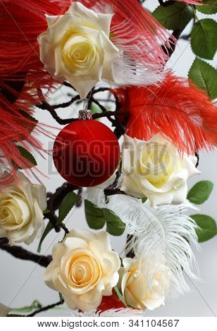 Roses. Holiday flower. China New Year. Red ball. White rose