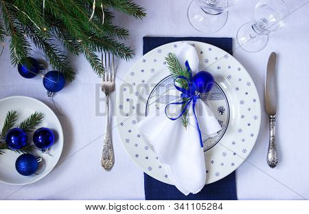 Christmas Or New Year Table Decoration In White And Blue Colors.
