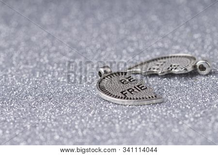 Silver  Broken Heart On Light Blue Gradient Background. Love And Relationship. Feelings And Emotions