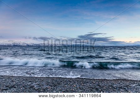 Beautiful View Over Beach And Fjord. Tornetrask, Sweden. Winter. Polar Night. Long Shutter Speed