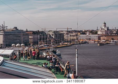 Editorial 06.19.2019 Helsinki Finland Car Ferry Silja Serenade Leaving Port With Passengers On Deck 