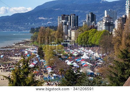 Downtown Vancouver, British Columbia, Canada - April 20, 2019: Aerial View Of Crowd Of People Gather