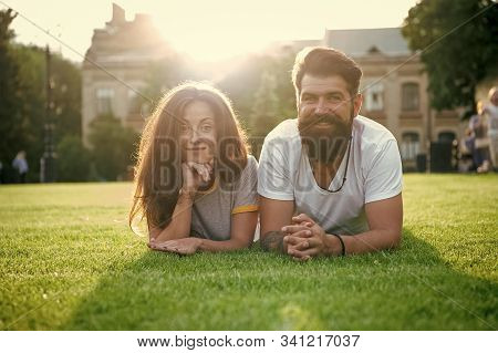 Adding Some Romance. Holiday Romance Of Bearded Man And Sexy Woman. Couple In Love Relaxing On Green