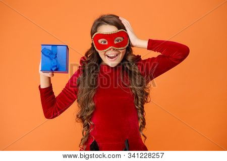 Winter New Year Party. Winter Carnival. Secret Santa Gift Concept. Kid Wear Eye Mask. Girl In Mask O