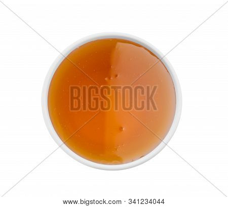 Bowl Of Organic Honey Isolated On White, Top View